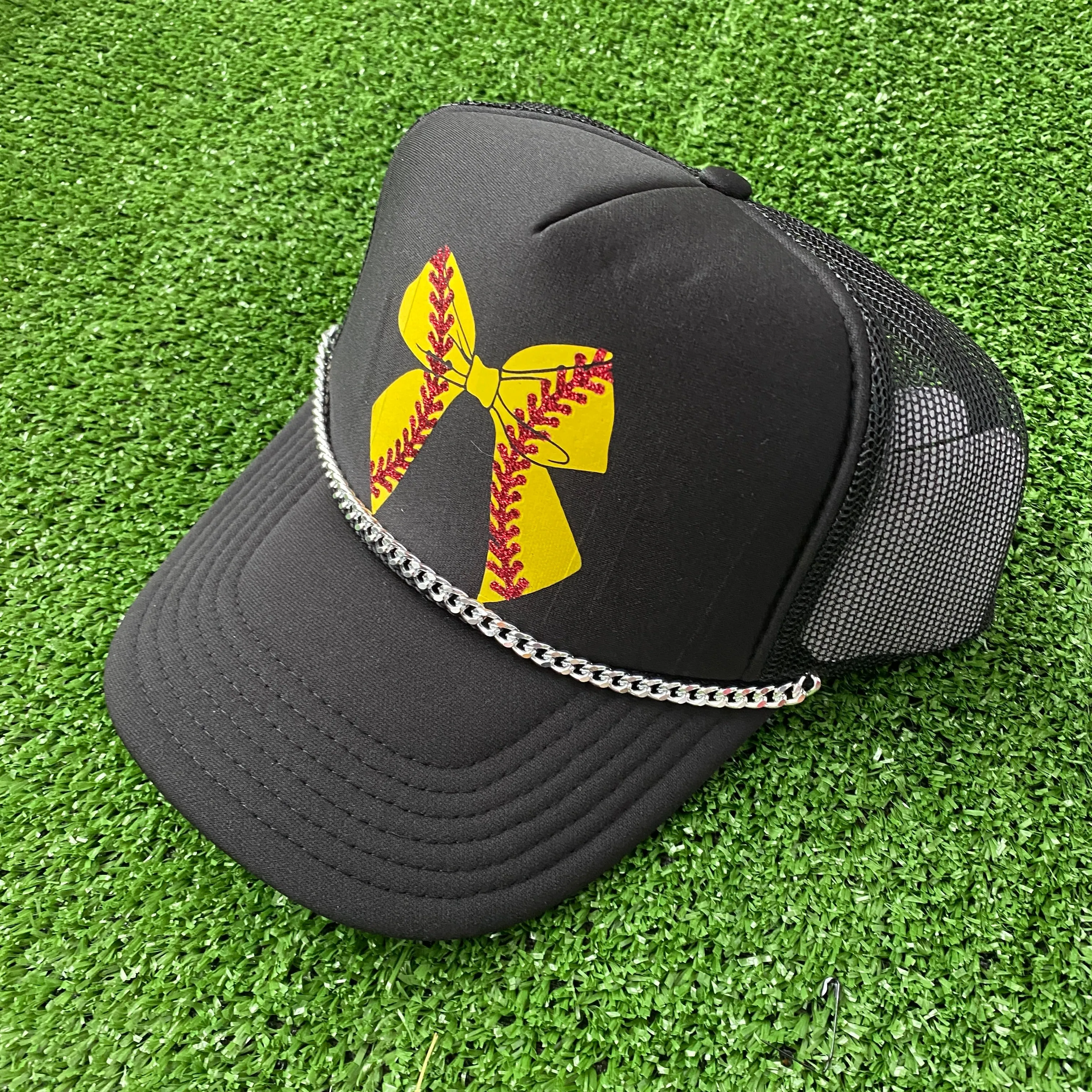 BLACK SOFTBALL BOW TRUCKER HAT WITH SILVER CHAIN